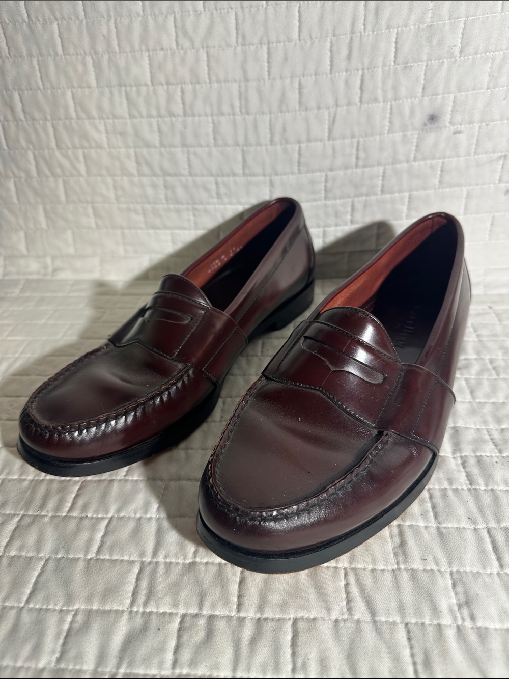 Cole Haan City Penny Loafers in a rich burgundy leather